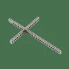 Pendentif croix en or blanc avec diamants