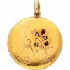 Pendentif en forme ronde avec perle de grenat