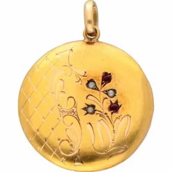 Pendentif en forme ronde avec perle de grenat