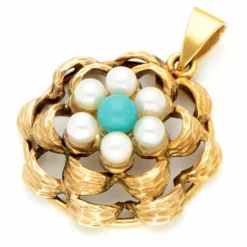 Pendentif en grappe de perles turquoise