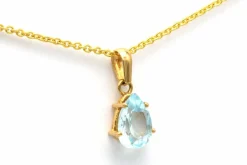 Pendentif en or 18 carats et topaze (0.77 ct)