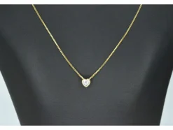 Pendentif en or avec un diamant taille brillant en forme de coeur