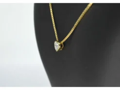 Pendentif en or avec un diamant taille brillant en forme de coeur
