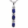Pendentif en or blanc avec diamants et saphir