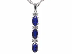 Pendentif en or blanc avec diamants et saphir