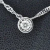 Pendentif en or blanc avec un diamant taille brillant