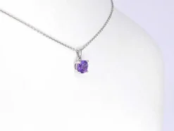 Pendentif en or blanc avec améthyste