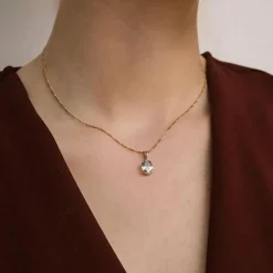 Pendentif en or jaune 18 carats avec aigue-marine facettée en forme de coussin