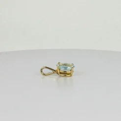Pendentif en or jaune 18 carats avec aigue-marine ovale facettée