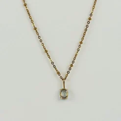 Pendentif en or jaune 18 carats avec aigue-marine ovale facettée