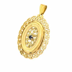 Pendentif en or jaune et pierre bleue