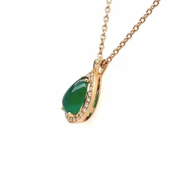 Pendentif en or rose 18 carats avec émeraude cabochon et diamants
