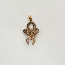 Pendentif masque, or jaune filigrané