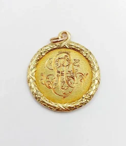 Pendentif médaille d'amour 23mm or jaune diamant et rubis AUGIS (circa 1920)