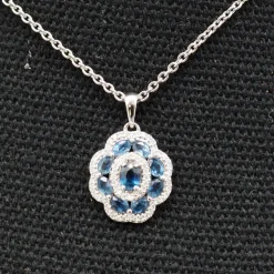 Pendentif or blanc saphirs diamants