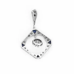 Pendentif or gris, diamants et saphirs