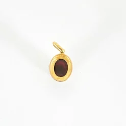 Pendentif or jaune grenat cabochon diamants