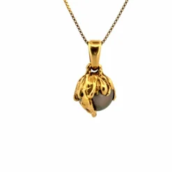 Pendentif or jaune perle de Tahiti