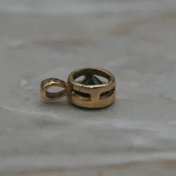 Pendentif or jaune Ttsavorite taille ronde