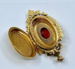 Pendentif porte souvenir ouvrant en or et grenat