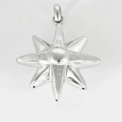 Pendentif soleil en or gris