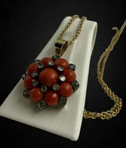 Pendentif étoile corail et diamant