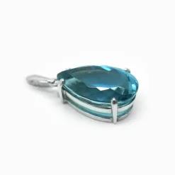 Pendentif Topaze bleue et or blanc
