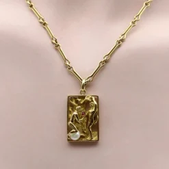 Pendentif vintage Adam et Ève en or 14 carats avec rubis et perle