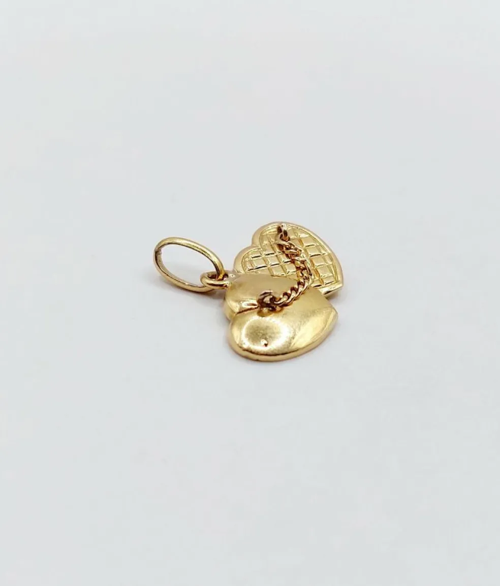 Pendentif vintage or 18k formant deux cœurs accolés reliés par une chaine