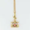Pendentif vintage téléphérique en or jaune