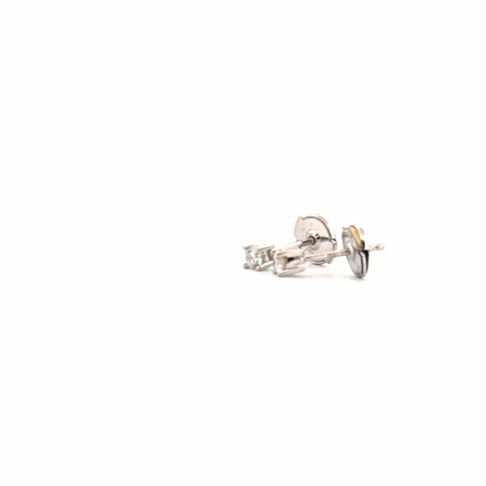 Puces d'oreilles or blanc diamants