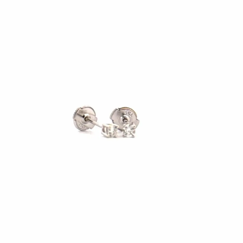 Puces d'oreilles or blanc diamants
