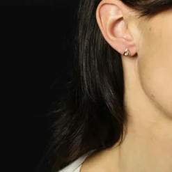Puces d'oreilles or jaune pierres blanches