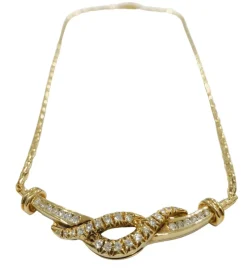 Ravissant collier or jaune et diamants entrelacés.