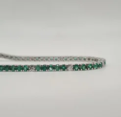Rivière or blanc sertie de diamants et émeraudes