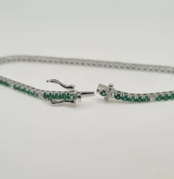 Rivière or blanc sertie de diamants et émeraudes