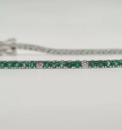 Rivière or blanc sertie de diamants et émeraudes