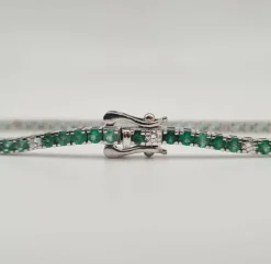 Rivière or blanc sertie de diamants et émeraudes