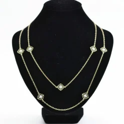 Sautoir diamants ors jaune et blanc arabesques