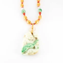 Sautoir en or corail et jade