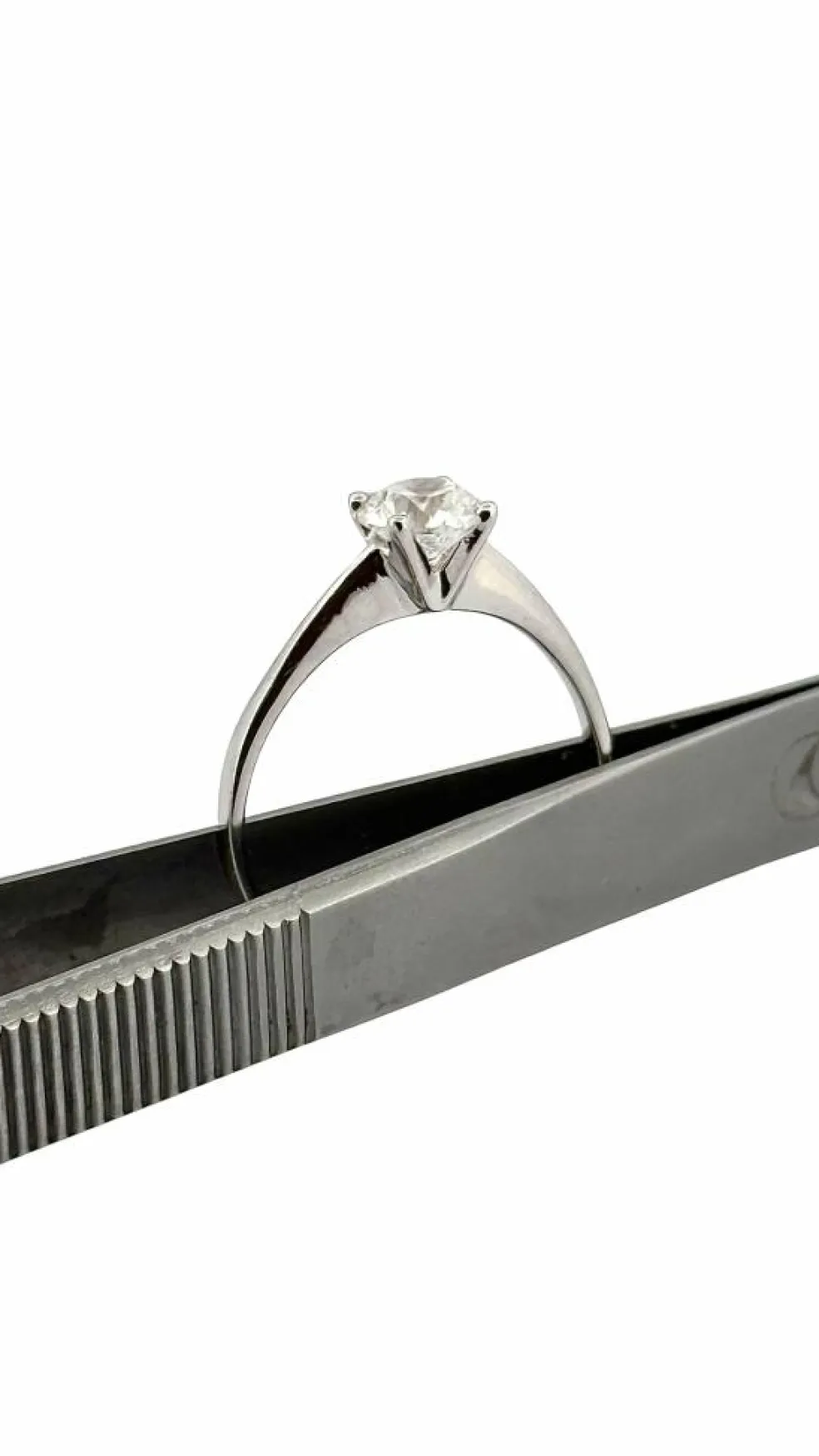 Solitaire diamant 1 carat , or blanc 18 carats