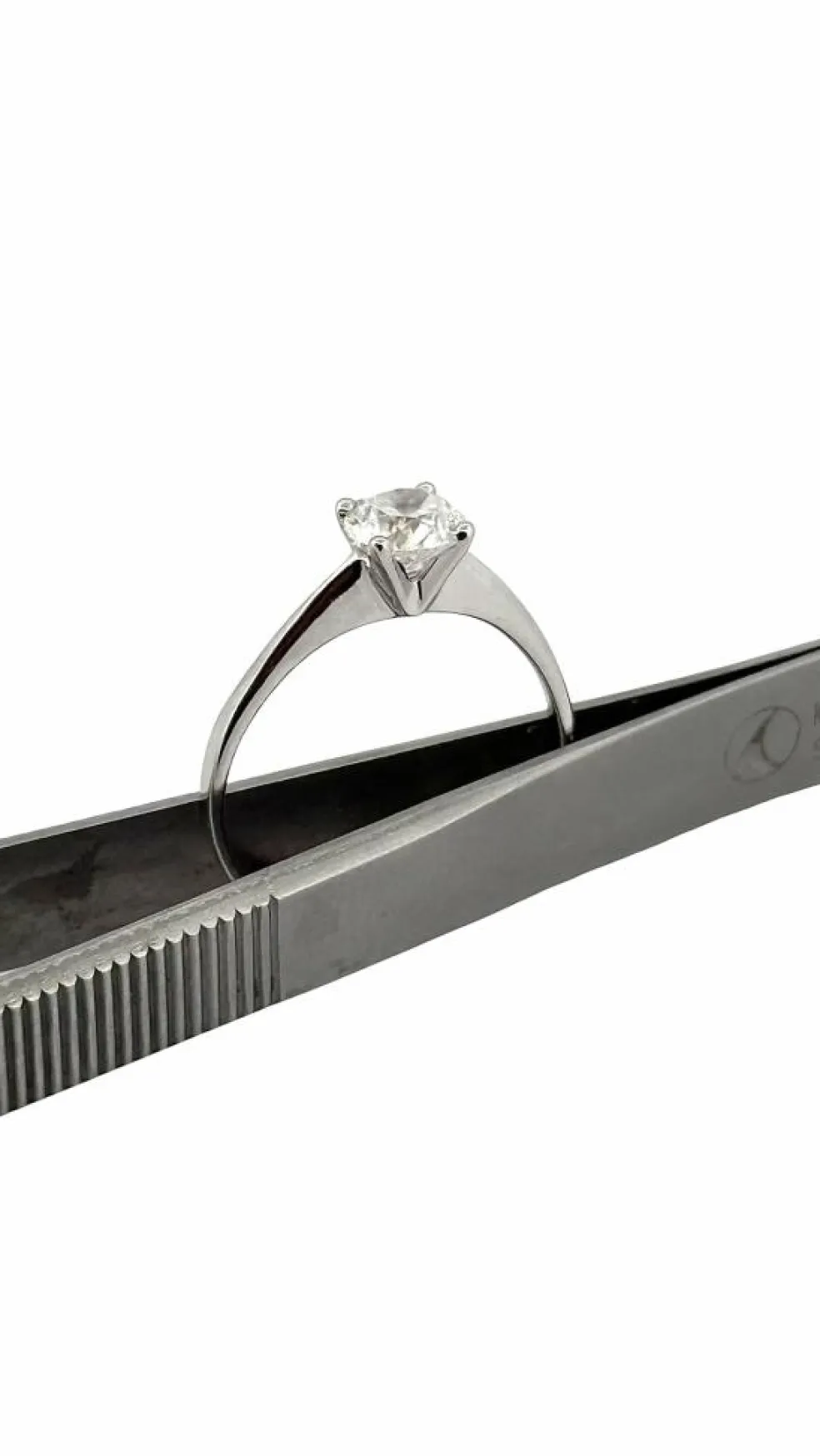 Solitaire diamant 1 carat , or blanc 18 carats