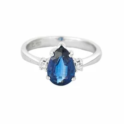 Solitaire or gris, saphir et diamants