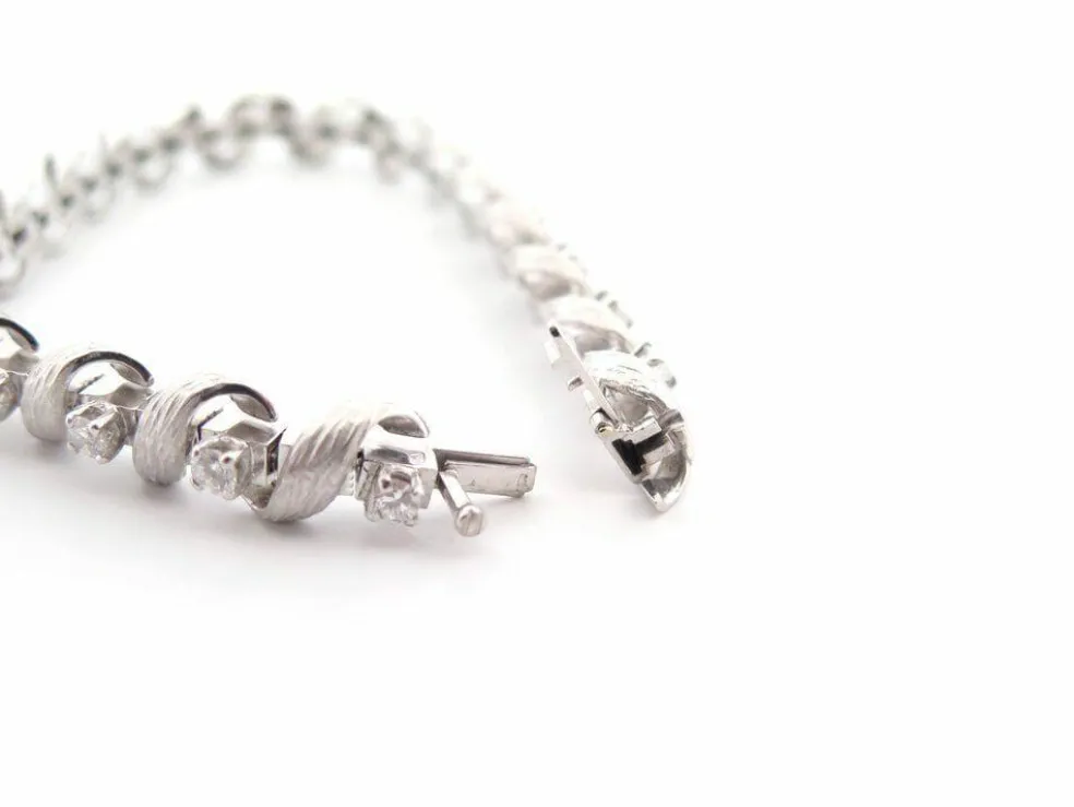 vintage bracelet art deco serti de 19 diamants 1.9ct en or blanc 18k 35gr